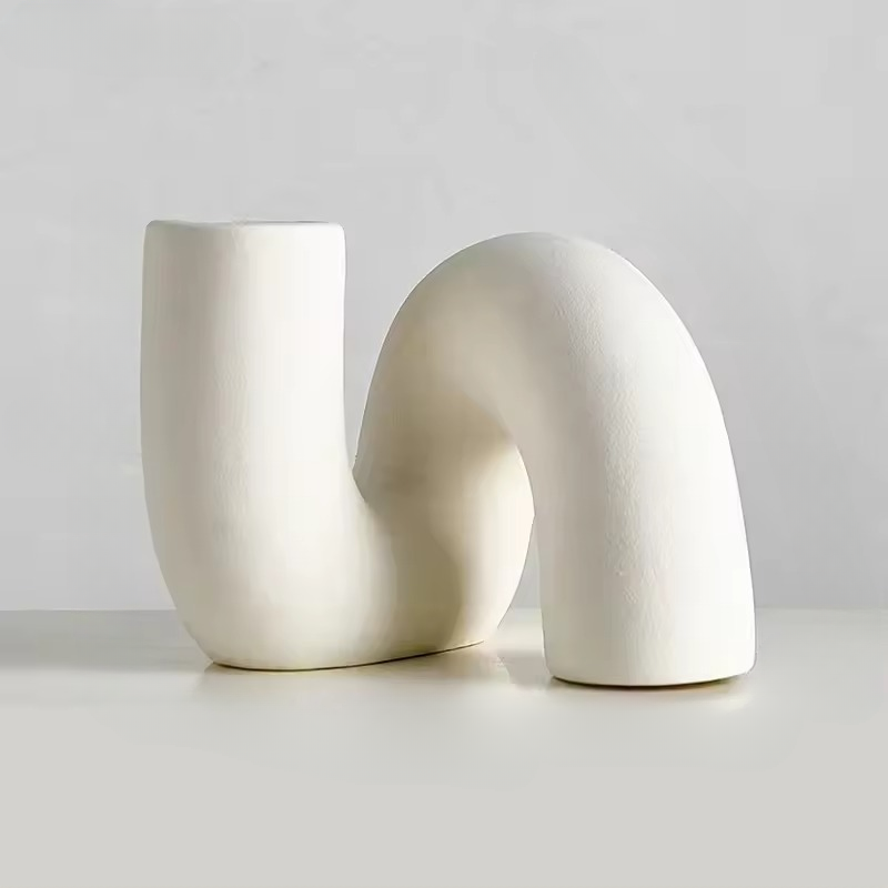 Modern Porcelain Vase with Matte Cream Finish and Sculptural Design