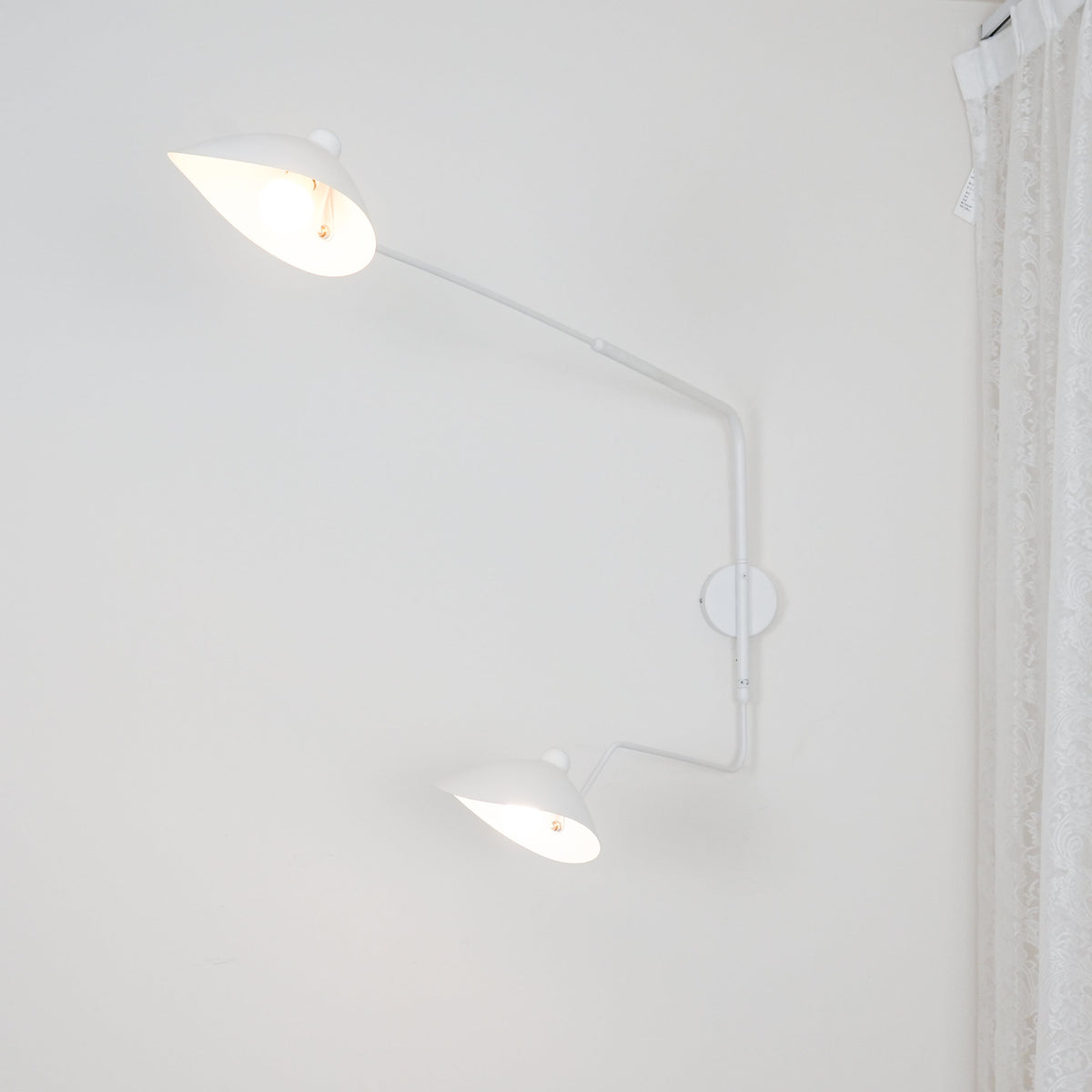 Adjustable Arm Metal Wall Sconce with LED Lighting in Black or White