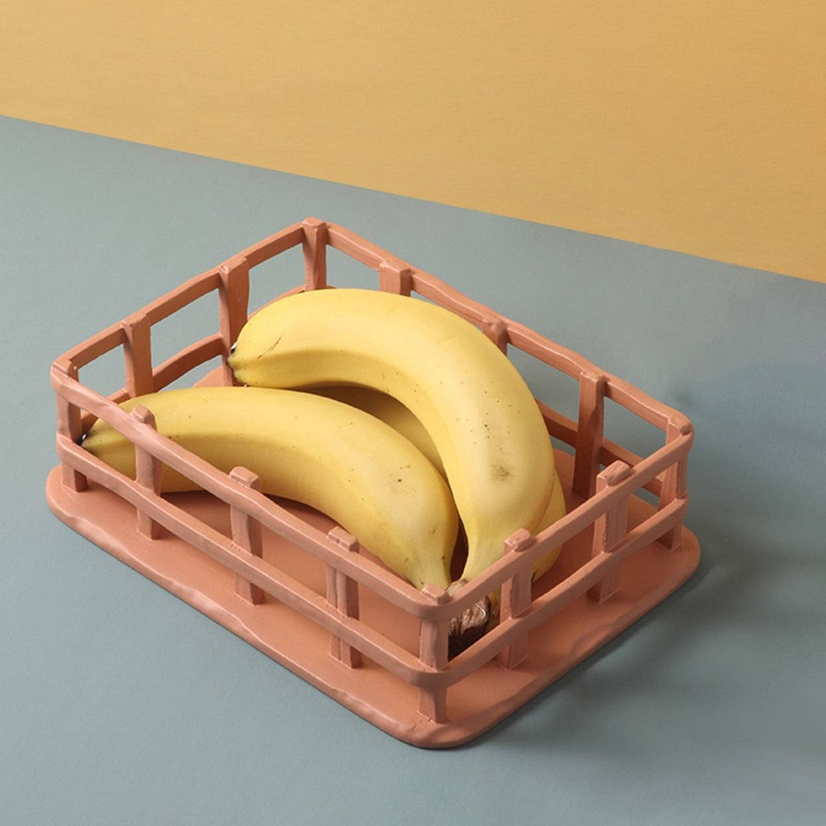 Handcrafted Resin Fruit Basket with Natural Woven Design