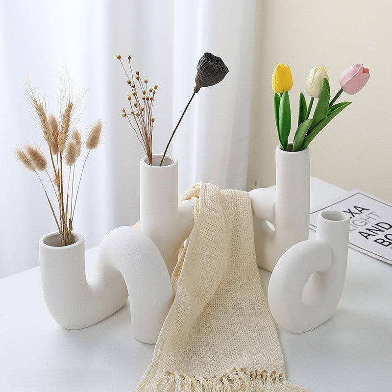 Modern Porcelain Vase with Matte Cream Finish and Sculptural Design