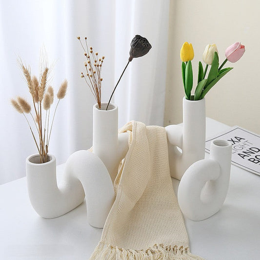Modern Porcelain Vase with Matte Cream Finish and Sculptural Design