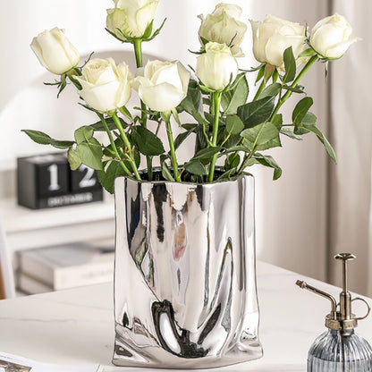 Silver Ceramic Sculptural Vase with Flowing Design and Mirror Chrome Finish
