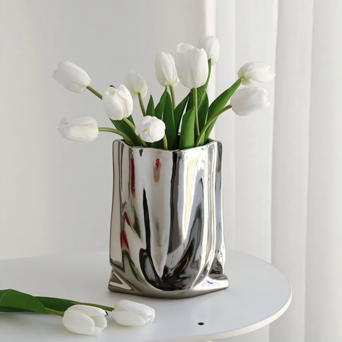 Silver Ceramic Sculptural Vase with Flowing Design and Mirror Chrome Finish