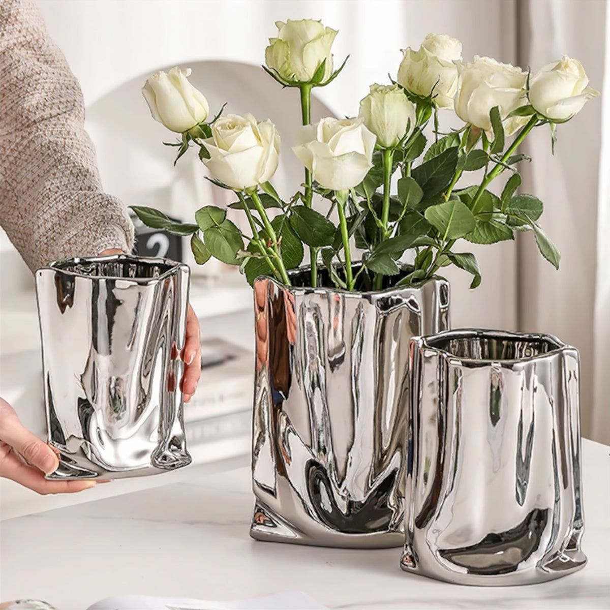 Silver Ceramic Sculptural Vase with Flowing Design and Mirror Chrome Finish