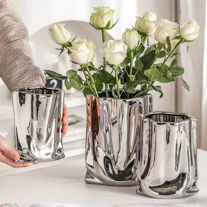 Silver Ceramic Sculptural Vase with Flowing Design and Mirror Chrome Finish