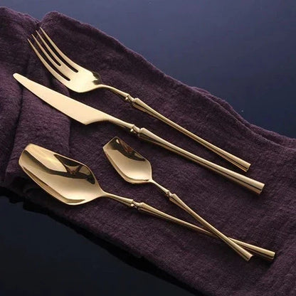 Stainless Steel Cutlery Set with Gold Accents and Polished Finish