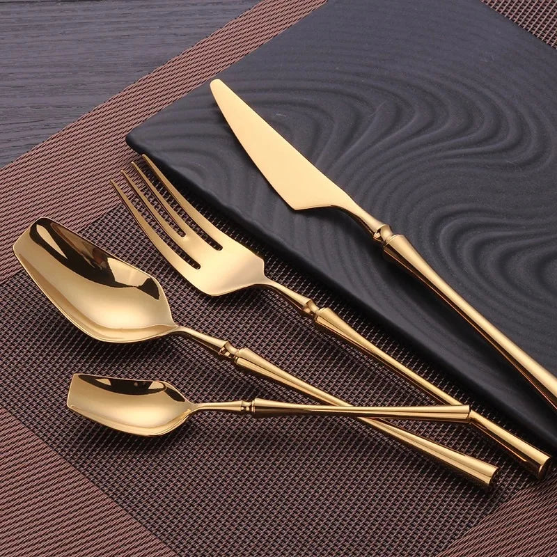 Stainless Steel Cutlery Set with Gold Accents and Polished Finish