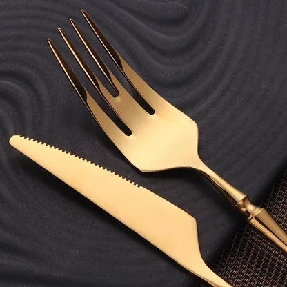 Stainless Steel Cutlery Set with Gold Accents and Polished Finish