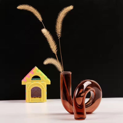 Swirl Glass Vase with Sculptural Design and Transparent Warm Tones