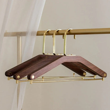 Walnut Wood and Brass Clothes Hangers for Stylish Wardrobe Organisation