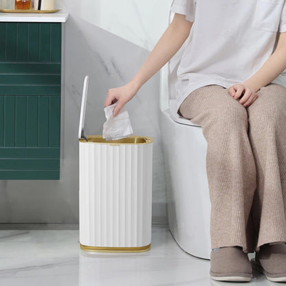 White Ribbed Bathroom Bin with Gold Trim and Push Lid
