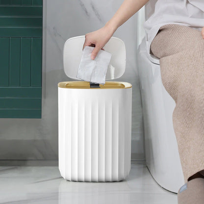 White Ribbed Bathroom Bin with Gold Trim and Push Lid